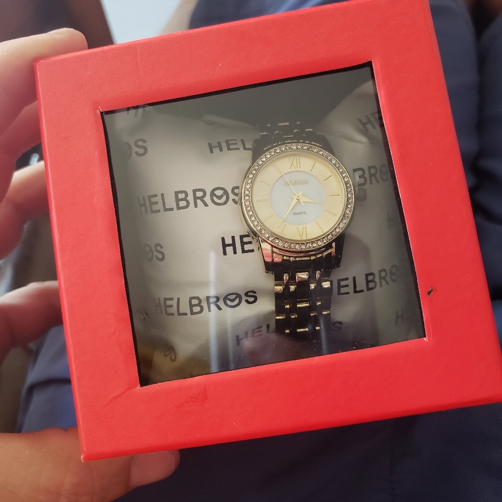 Ladies Helbros gold tone mother of pearl watch